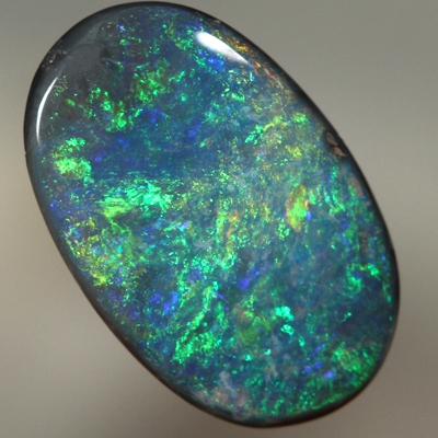 SOLID BLACK OPAL Candy red and orange over green
